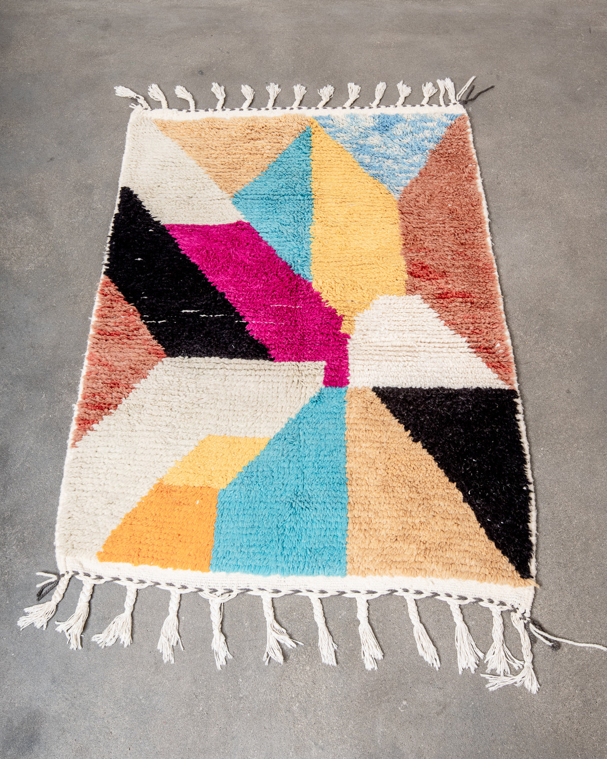 Modern, designer, handcrafted Berber rug from Morocco. Beniourain carpet with beautiful colours and patterns and fluffy wool texture.